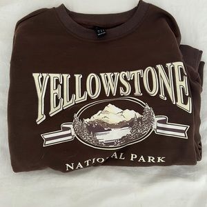 Shein brown and yellow crewneck. Size small. Says “YELLOWSTONE NATIONAL PARK”